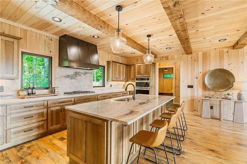 Chef's kitchen with marble island